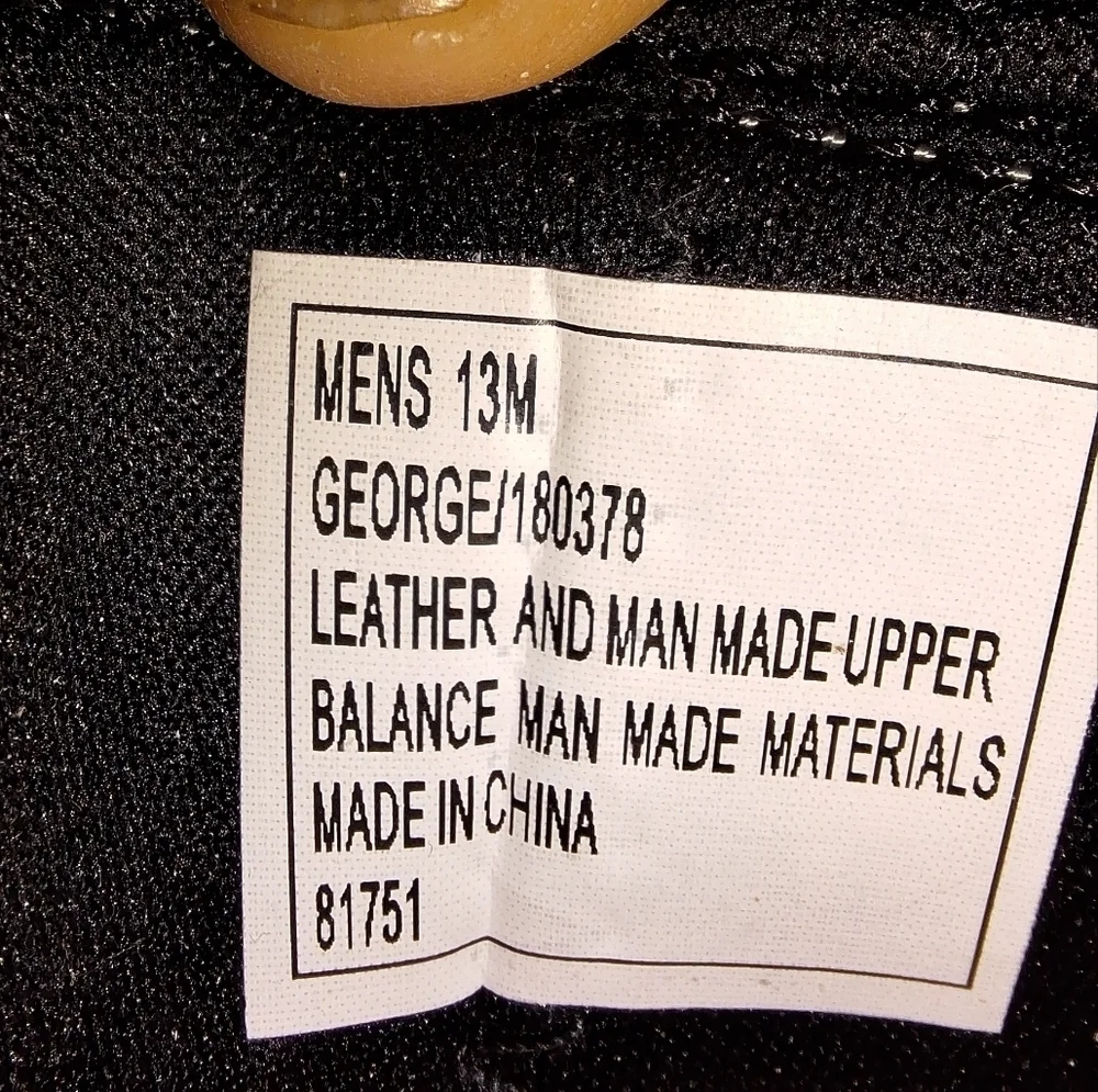 A pair of Coleman George sandals in a men's size 13M. They're in excellent shape